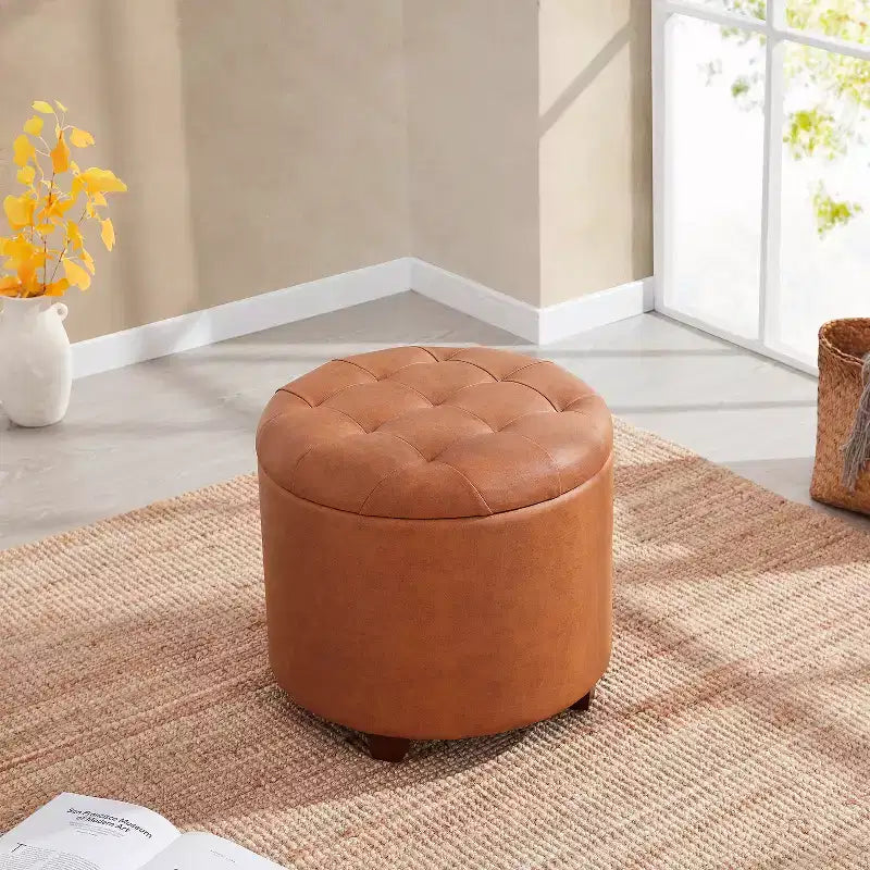 Pouffe de rangement rond capitonné en similicuir avec pieds en bois