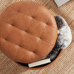 Pouffe de rangement rond capitonné en similicuir avec pieds en bois