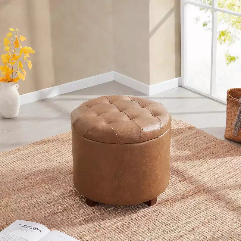 Pouffe de rangement rond capitonné en similicuir avec pieds en bois